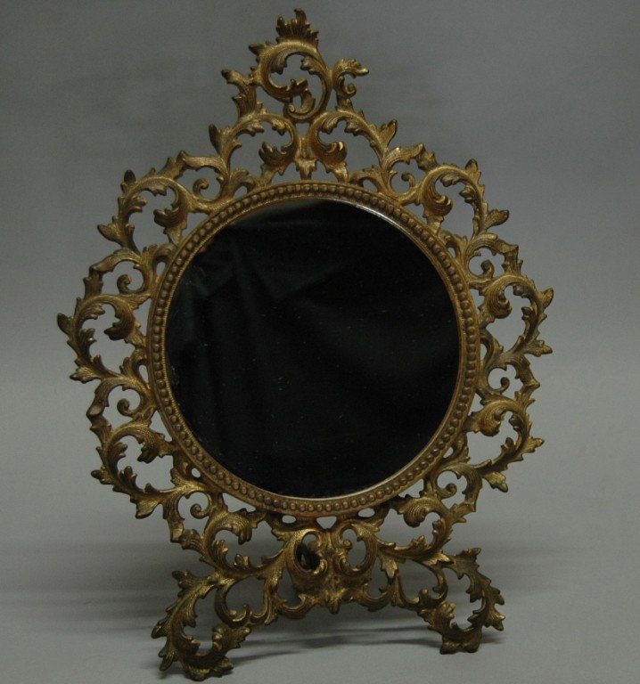 Brass Dresser Mirror: Ornate brass dresser mirror, 12.5 dia, 15.5 h.
