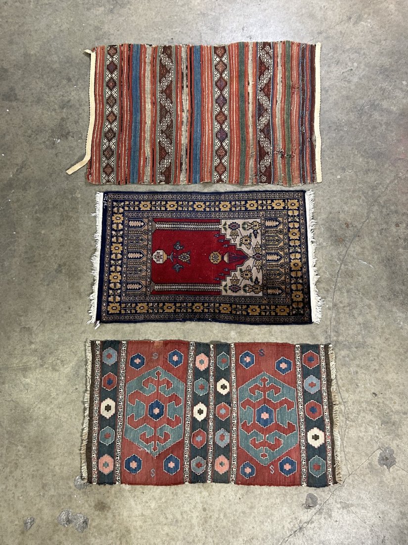 3 Vintage Persian Prayer Rugs: 3 Vintage Persian Prayer Rugs. 1.) 23" x 34" Red, blue gold rug : Persian prayer rug Made in Iran Circa: 1980. 2.) 21" x 36" Rust, blue rug (some staining on fringe) : Persian Kilim, Made in Iran Circ