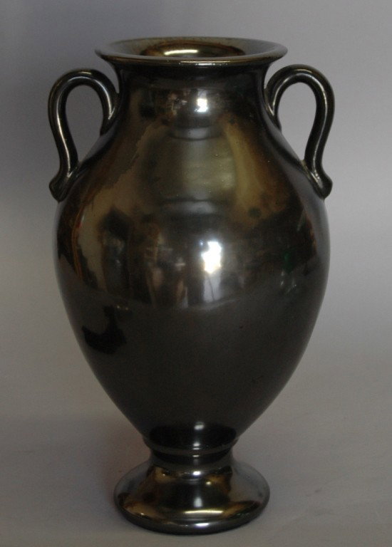 Fulper Pottery Urn Vase: Fulper Pottery "Mirror Black" glaze urn vase, bulbous middle with slender neck and foot, double handle, 12.5H, double impressed FULPER in oval mark.