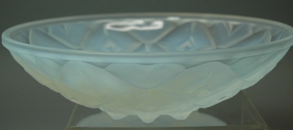 French Opalescent Bowl in the style of Sabino: French opalescent molded form bowl, marked Made in France, in raised letters, attributed to Sabino Glass, mint, 9.5 dia.
