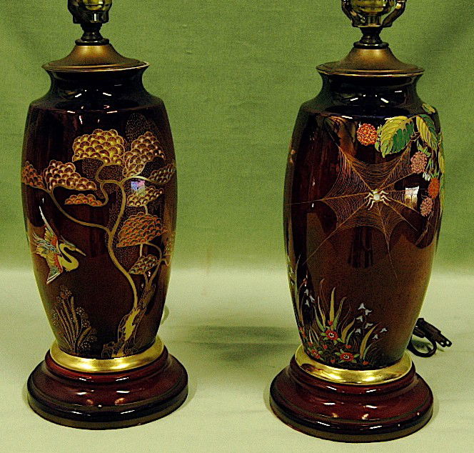 Pair of Carlton Ware Lamps: Pair of Carlton Ware factory lamps, one with spider web and florals, the other with flying crane and Ming trees, beautiful red luster, good condition, 12.5 to socket caps.