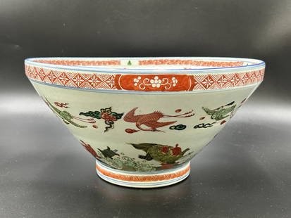 Chinese Porcelain Wucai Contemporary Bowl: Chinese Dragon, Animals & Floral Decorated Wucai Contemporary Bowl. Beautiful large bowl measuring 12" diameter and 6.25" tall with a weight of 4.5lbs. There is one place with a surface glaze crack.