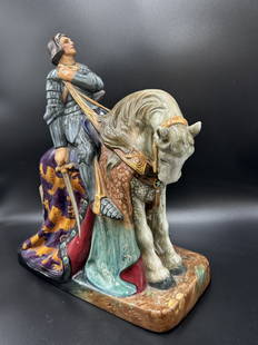 Large St. George Royal Doulton Figurine HN 2067: St. George Royal Doulton Figurine HN 2067. This piece was issued from 1950 to 1979 and based on a 1915 study by Stanley Thorogood. Depicts an armored warrior with dark hair in full warrior garb with