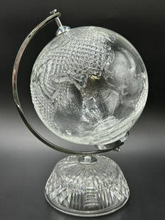 Large Waterford Crystal World Globe: Large Waterford Crystal World Globe. This beautiful globe features fine Waterford crystal ball with a relief map pattern globe on a crystal base with chrome accents. Perfect for a library, office or d