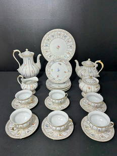 Meissen MSS73 Porcelain Tea & Coffee Set- 22 pcs: Meissen MSS73 Porcelain Tea & Coffee Set- 22 pcs. Meissen mark on the bottom. (1) Coffee pot 10 1/2" tall x 7" wide. (1) Teapot 9" tall x 9" wide. (1) Sugar bowl 6" tall x 6 1/2" wide. (1) Cream bowl