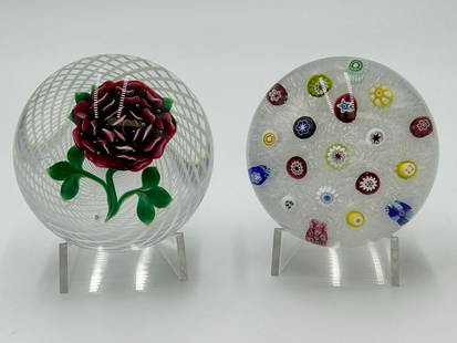 Estate Vintage Lot of 2 Baccarat Paperweights: Estate Vintage Lot of 2 Baccarat Paperweights. (1) 1974 Baccarat Millefiori Paperweight etched with makers mark and the number 13 on the bottom of the piece. Colorful diverse millefiori complex canes