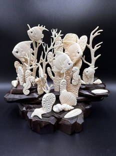 Hand Carved Chinese Under the Sea Sculpture on Wooden Base: Hand Carved Chinese Under the Sea Sculpture on Wooden Base. Beautiful hand carved under the sea life with coral, fish, seahorse, seashell & Starfish. The sculpture measures 8" tall x 10" wide x 5 1/4"