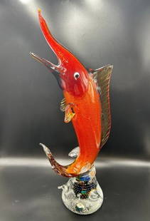 Large Murano Italy Art Glass Swordfish Sculpture: Large Murano Art Glass Swordfish Sculpture. The piece is 27" tall x 10" at its widest point. Beautiful shades of red, orange, yellow and gold on a clear base. There is no signature or marking. We beli