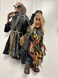 Pair of Large Wizard & Witch Marionettes by Cesky Krumlov, Czech Republic: Pair of Large Wizard & Witch Marionettes by Cesky Krumlov, Czech Republic. Both pieces are extremely detailed from head to toe in natural made fabrics, wood legs and footwear. The puppets head and arm