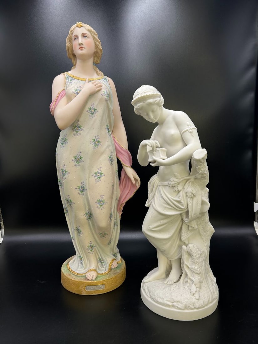 2 Large Parian Ware - Bisque Women Statues Minton-Copeland: Estate Lot of 2 Parian Ware and Bisque Women Statues. 1). Minton 17" tall unknown named half nude lady holding a small treasure box. Standing barefoot among a tree trunk and leaves. There is no chips,
