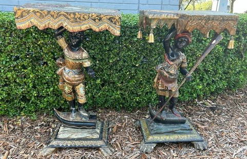 19th Century Venetian Ebonized & Polychrome Hand Carved Blackamoor Tables: Pair of 19th Century Venetian Ebonized & Polychrome Hand Carved Blackamoor Tables. The polychromed faux-draped-covered rectangular top above a figural blackamoor support. Each is standing at the bow o