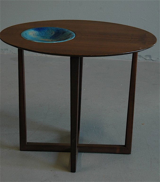 Selig of Denmark Occasional Table: Selig of Denmark occasional table with copper enameled bowl inset, red metal tag, 22.5w, 17, 19h. Good condition.