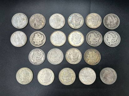 21 Morgan Silver Dollars from 1878-1921: 21 Morgan Silver Dollars from 1878-1921. Various grades and dates: 1 (1878) - 1 (1879) - 1 (1880) - 1 (1882) - 2 (1884) - 1 (1886) - 2 (1884) - 1 (1886) - 1 (1888) this coin is quite worn - 2 (1889)