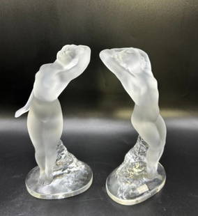 Pair of Lalique Frosted Crystal Nude Dancer Sculpture Figurines: Pair of Lalique Frosted Crystal Nude Dancer Sculpture Figurines. These are two vintage Lalique dancer nude figures with partial frosted surface. They measure 9.25" , are both signed on side of base