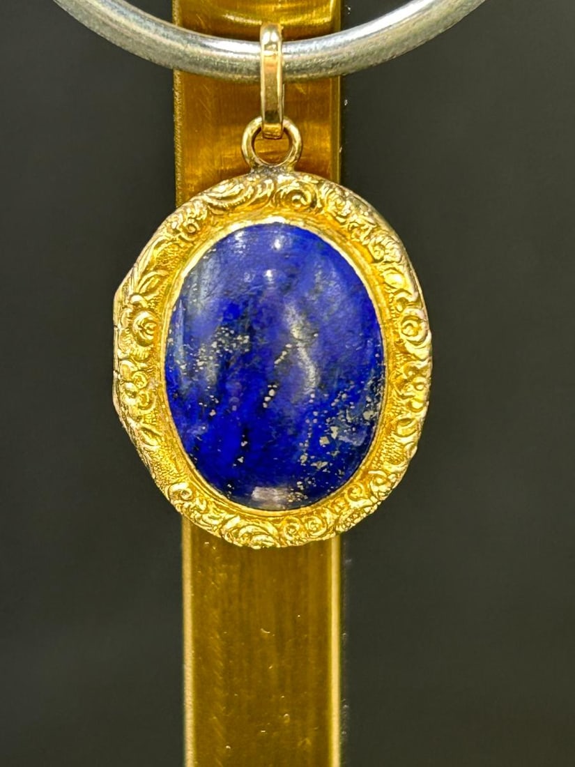 14k Gold Victorian Lapis Vinaigrette Scent Locket: 14k Gold Victorian Lapis Vinaigrette Scent Locket. This beautiful oval shaped locket has a blue lapis center stone on both sides (.75" x .50" ) surrounded by scrolled 14k gold (1" x .75"). With hinges