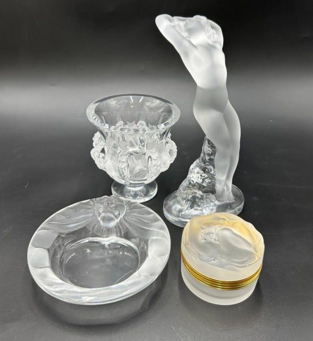 Estate Lot of 4 Signed Lalique Art Deco Pieces France: Estate Lot of 4 Signed Lalique Art Deco Pieces France. This a beautiful estate lot of Lalique cyrstal pieces (1). Clear and frosted "Danseuse" Nude Dancer. She is 10" H x 4.75" W, in perfect condition