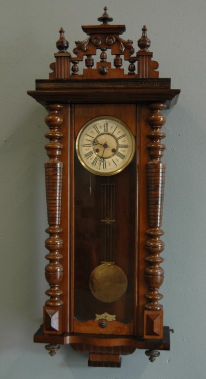Vienna Regulator Wall Clock: Vienna Regulator wall clock, marked and made by Mauthe, 1923, very ornate walnut case, 48" tall, good condition.