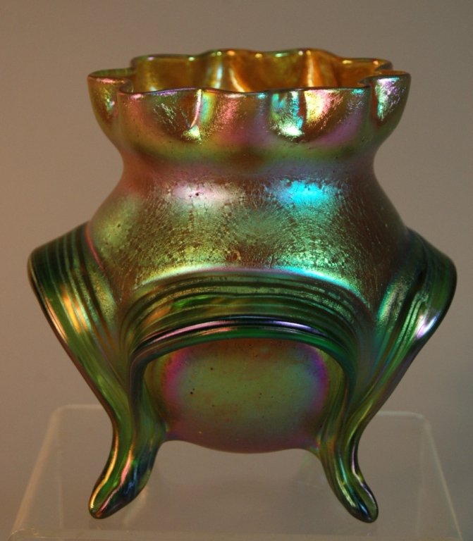 Loetz Art Glass Vase: Loetz iridescent art glass "Phanomen Genre" footed vase, 5.5" tall, with crimped top, undulating striped ribbons making the foot, changes colors at every angle, mint.