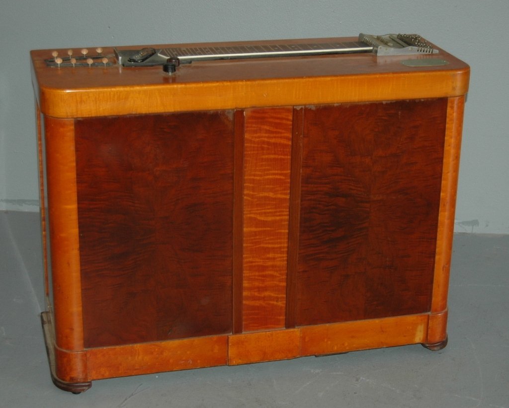 Gibson Electraharp Steel Pedal Guitar: Gibson "Electraharp" steel pedal guitar c 1938. this unit is reportedly #2 of 13 made by Gibson, cabinet measures 38"wide, 28" high, 14" deep. It was purchased and used by the George Hines Band in NY