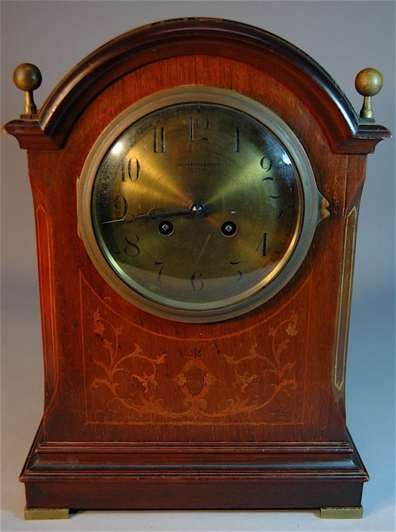 Black, Starr and Frost Bracket Clock: Black, Starr and Frost NY bracket clock, mahogany marquetry inlaid case, brass dial, 14" tall, 9" wide, 7" deep, good condition. Circa 1904.
