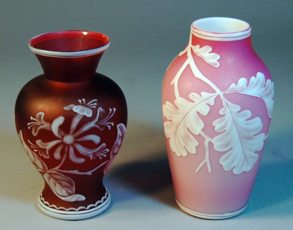 2 Cameo Glass Vases: 2- cameo glass vases: 5.5" tallest, with oak leafs and acorns on peach blow background. One has florals on cranberry frosted background, both mint condition, attr. to Thomas Webb and/or Northwood.
