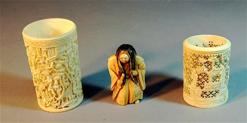 3 Piece Group of Ivory: 3 Piece group of ivory: 2 profusely carved hollow rings, 3.5" the tallest with Samurai figural carved netsuke with rotating facial expressions, good condition.