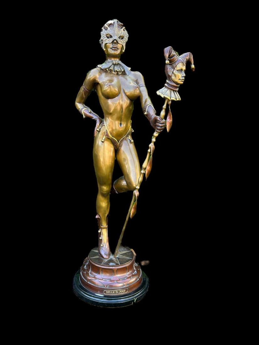 40" Tall - Bill Toma (20th C.) "Bell de Jour" Bronze Sculpture 10/36 1999: 40" Tall Bill Toma (20th C.) "Bell de Jour" Bronze Sculpture 10/36 1999. The statue is a nude woman with a Mascaraed Mask, Boots and holding a staff with a Jester on the top. The name is on brass plat