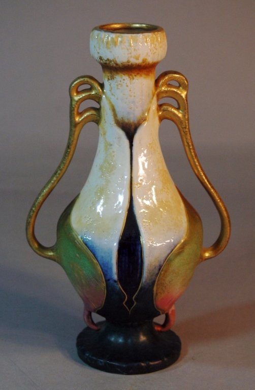 Amphora Polychrome Vase: Amphora polychrome vase, double gold handles, cream background with green leaves and cobalt, signed "Amphora", "Austria" and impressed crown mark, perfect condition, 8.25" h.