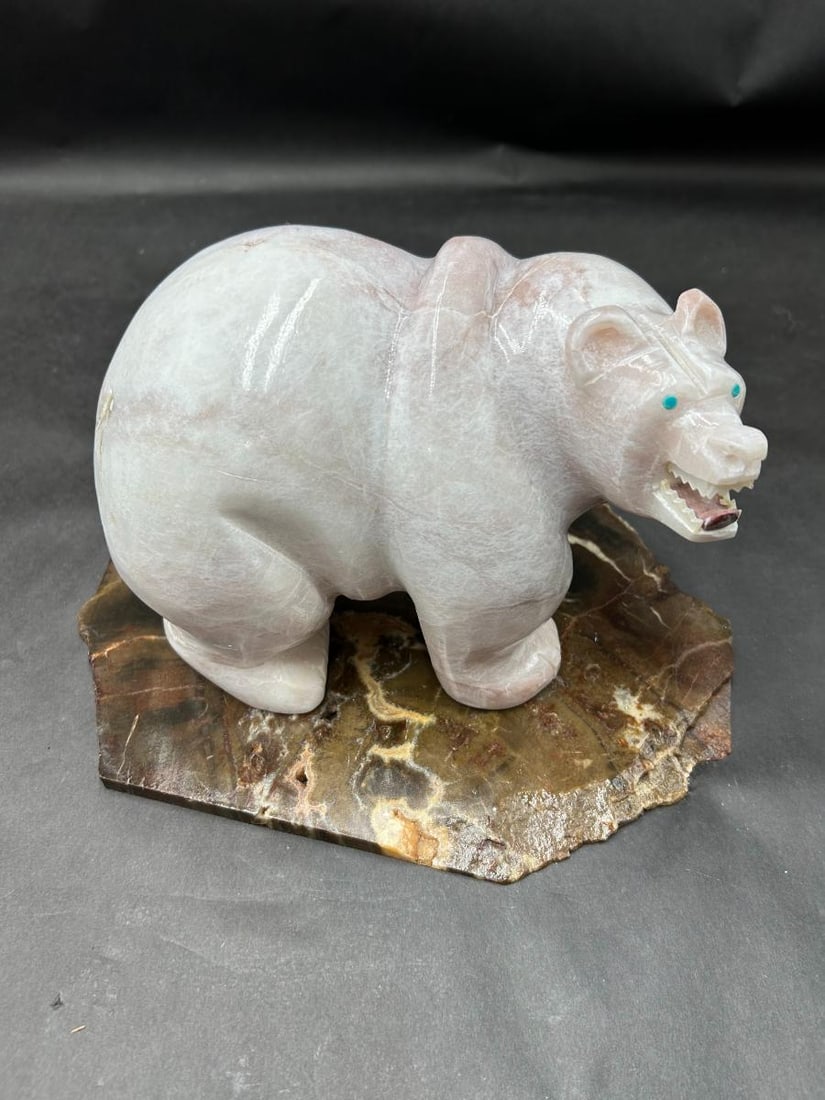 1970's Larry Antez Signed Pink Soapstone Bear on Slate Sculpture: 1970's Larry Antez Signed Pink Soapstone Bear on Slate Sculpture. Zuni artist Larry Antez beautiful pink bear with carved teeth, tongue and turquoise jeweled eyes. It is signed on the bottom of one of