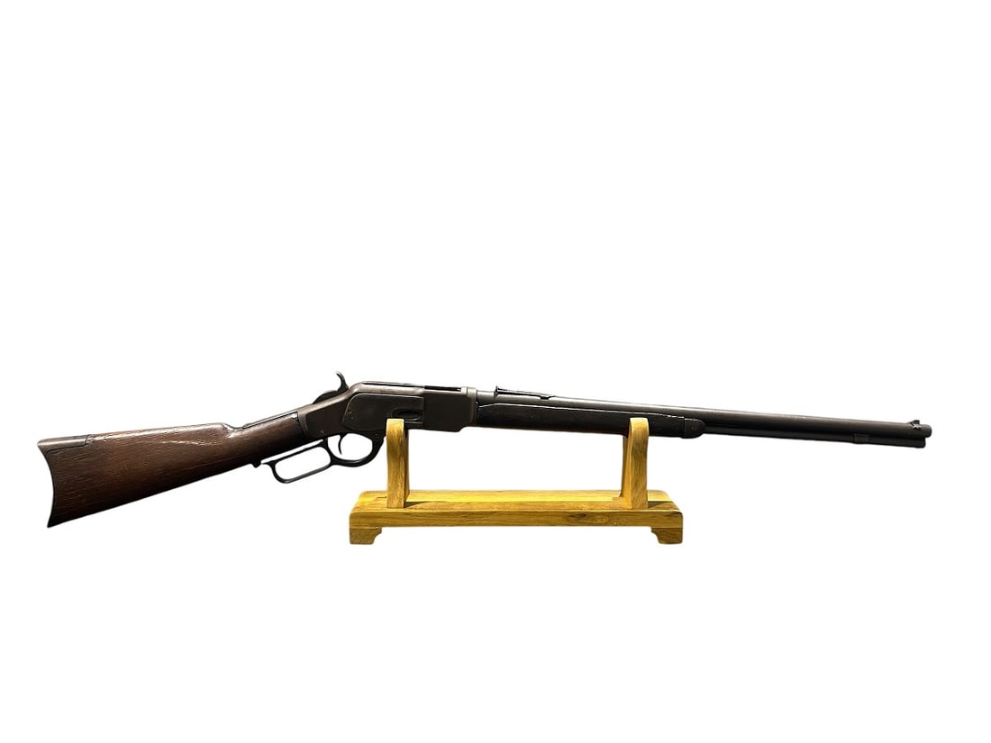 1890 Winchester .22 Cal. Model 1873 Rifle: 1890 Winchester .22 Cal. Model 1873 Rifle. This is a second model rifle with very clean bore. Marked/Dated 1890 per Winchester Repeating Arms Co., Directory. Serial # 382819B (marked) . The gun has a