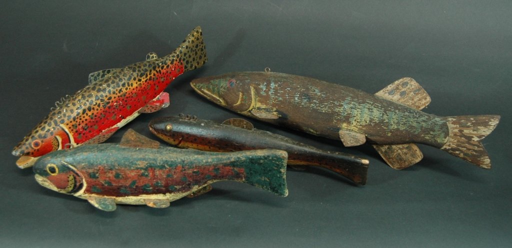 Group of 4 Fish Decoys: Group of 4 fish decoys, hand carved and painted, these are from Michigan descended through local estate. Largest is 16" Pike, smallest is 11" brown trout. Lead weighted with tin fins and hooks, These