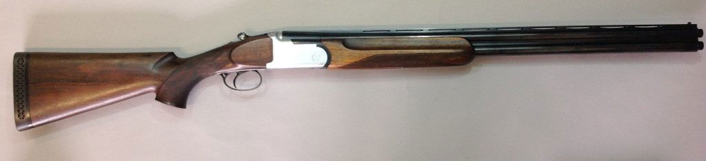 Rottweil "American Skeet" Shotgun: Rottweill American Skeet 12 gauge over-under with 3 additional gauge barrels- .410, 20 and 28. Vented rib barrel. 44.5 overall. European walnut checkered stock. Has hard fitted case for all. Excellent