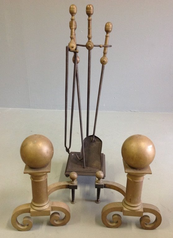 Brass Cannonball Andirons and Tools: Massive brass cannonball andirons and fireplace tool set. Front of andirons are 21h, extends to 27L on forged log holders. Tool holder has heavy cast iron base plate. Quality set in good condition.