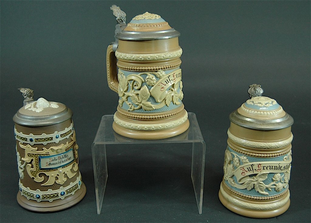 3 Villeroy & Boch, Mettlach Steins: 3 Villeroy & Boch, Mettlach cameo relief decorated steins, #1740, #1740 and #1745 with pewter & porcelain lids, all mint condition. .25L.