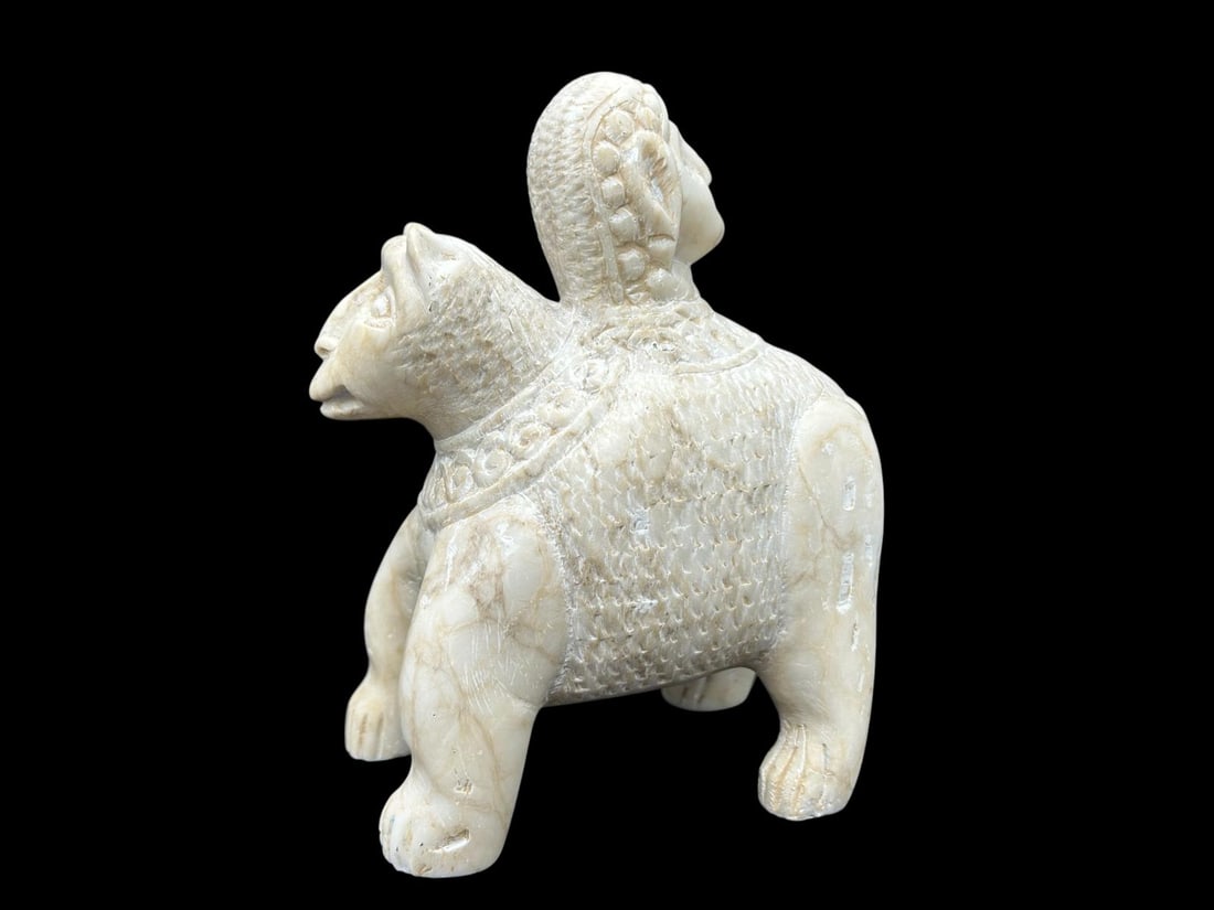 Hand Carved Stone Sculpture Man and Animal: Hand Carved Stone Sculpture Man and Animal . This is interesting sculpture depicting a bear with ceremonial garb necklace with a mans head on its back. Carved marble or fossilized bone, there are a fe