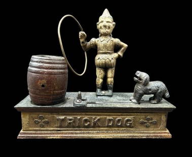 Antique Cast Iron Shepard Hardware Company "Trick Dog" Mechanical Bank: Antique Cast Iron Shepard Hardware Company "Trick Dog" Mechanical Bank. This antique bank depicts a clown figure holding a hoop that the dog jumps through to deposit the coin when lever is