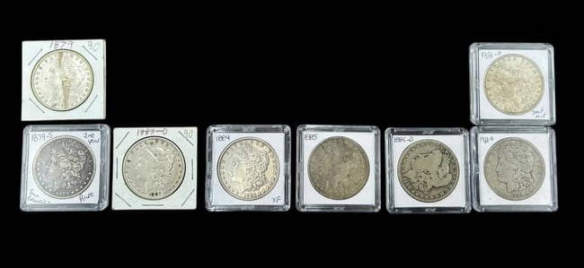 Estate Lot of 8- Morgan Silver Dollars 1879-1921: Estate Lot of 8- Morgan Silver Dollars 1879-1921. 2-1879 (90 & 1879-S 2nd year, San Francisco) 1- 1883 -O (New Orleans), 1-1884 XF (grading quality), 1-1885 (no mint mark) , 1-1889-D (Denver), 2-1921