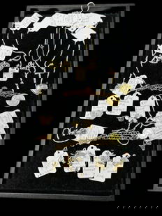 Estate Lot of 20 pieces of 14k Gold Charms and Bracelets 62 grams: Estate Lot of 20 pieces of 14k Gold Charms and Bracelets 62 grams. This lot consists of 60 grams of 14k yellow gold various charms and 3 charm bracelets. There is 1 10K gold basket pin with Aquamarine