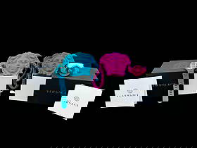 Lot of 2 Authentic Versace Pop Watches 38mm Medusa with Matching Case: Lot of 2 Authentic Versace Pop Watches 38mm Medusa with Matching Case. These are both in like new, working condition Versace watches. These each have the Medusa face Versace logo and silicone straps.