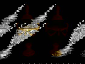 Pair of Baccarat Style Etched Crystal & Gilt Bronze 19" Urns: Pair of Baccarat Style Etched Crystal & Gilt Bronze 19" Urns. These are stunning lidded urns with gilt gold lid with flame on top, handled rims with draped ribbon and bronze base. The crystal is etche