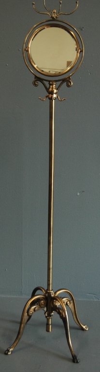 Brass Costumer with Shaving Mirror: Brass costumer (valet) with swivel beveled shaving mirror. Mirrors on both sides, good condition. 72" H. c. 1890.