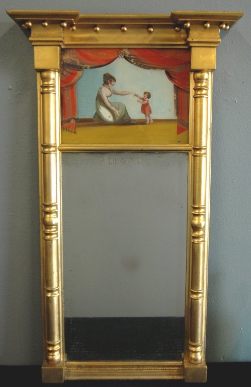 Early American Federal Mirror: Early American Federal mirror, reverse painted scene of Mother and child, gold leaf with overhang cornice top, 13 gold attached balls, turned 1/2 columns sides, beveled mirror, 39" H, 23" W. Very good
