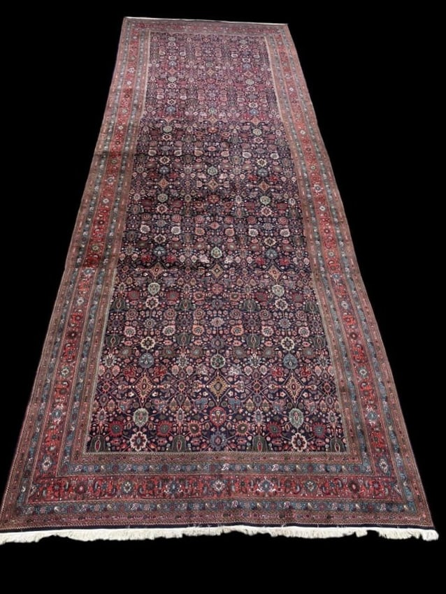 Mahal Rug, Northwest Persia Wool on Cotton Foundation 27' x 9.75' with Appraisal: Mahal Rug, Northwest Persia Wool on Cotton Foundation 27' x 9.75' with Appraisal. This rug, Circa 1930's, has a blue field with all over "Herati" design, rows of flower heads framed within the lattice