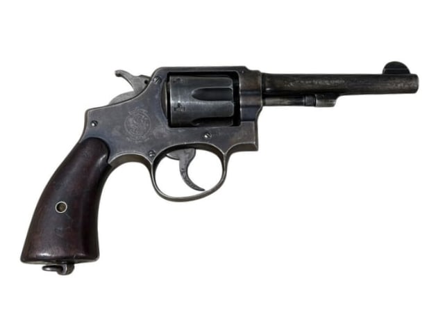 Smith & Wesson Military / Police Revolver Model 10 .38 Special: Smith & Wesson Military / Police Revolver Model 10 .38 Special. Vintage, Made in the USA, has 6" barrel. Shows some signs of age, nice walnut grip. Pulls back and moving parts appear to be in
