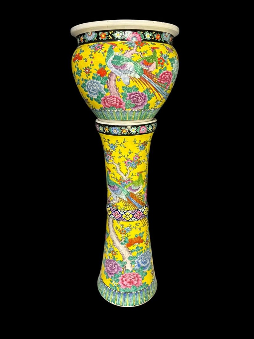 Chinese Porcelain Famille Jaune Tall Pedestal with Planter 35.5": Chinese Porcelain Famille Jaune Tall Pedestal with Planter 35.5" . This is a stunning piece with a brilliant yellow backdrop with birds, flowers and trees in bright colors. The planter sits inside