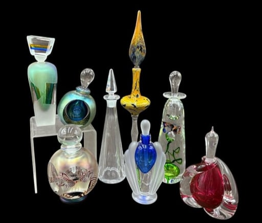 Collection of 8 Art Glass Perfume Bottles, some signed, Baccarat: Collection of 8 Art Glass Perfume Bottles, some signed, Baccarat. This is a stunning collection of unique, some signed art glass perfume bottles: 1)signed 12" tall hand blown glass, delicate with a te
