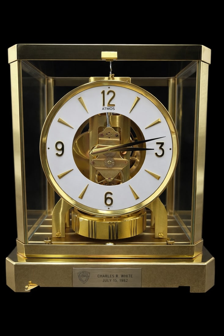 1982 Jaeger-LeCoultre Atmos Swiss Made Mantel Clock with Original Paperwork: 1982 Jaeger-LeCoultre Atmos Swiss Made Mantel Clock with Original Paperwork. This is a working Atmos clock, most likely a company gift. Personalized plaque on front of clock, could be removed, only at