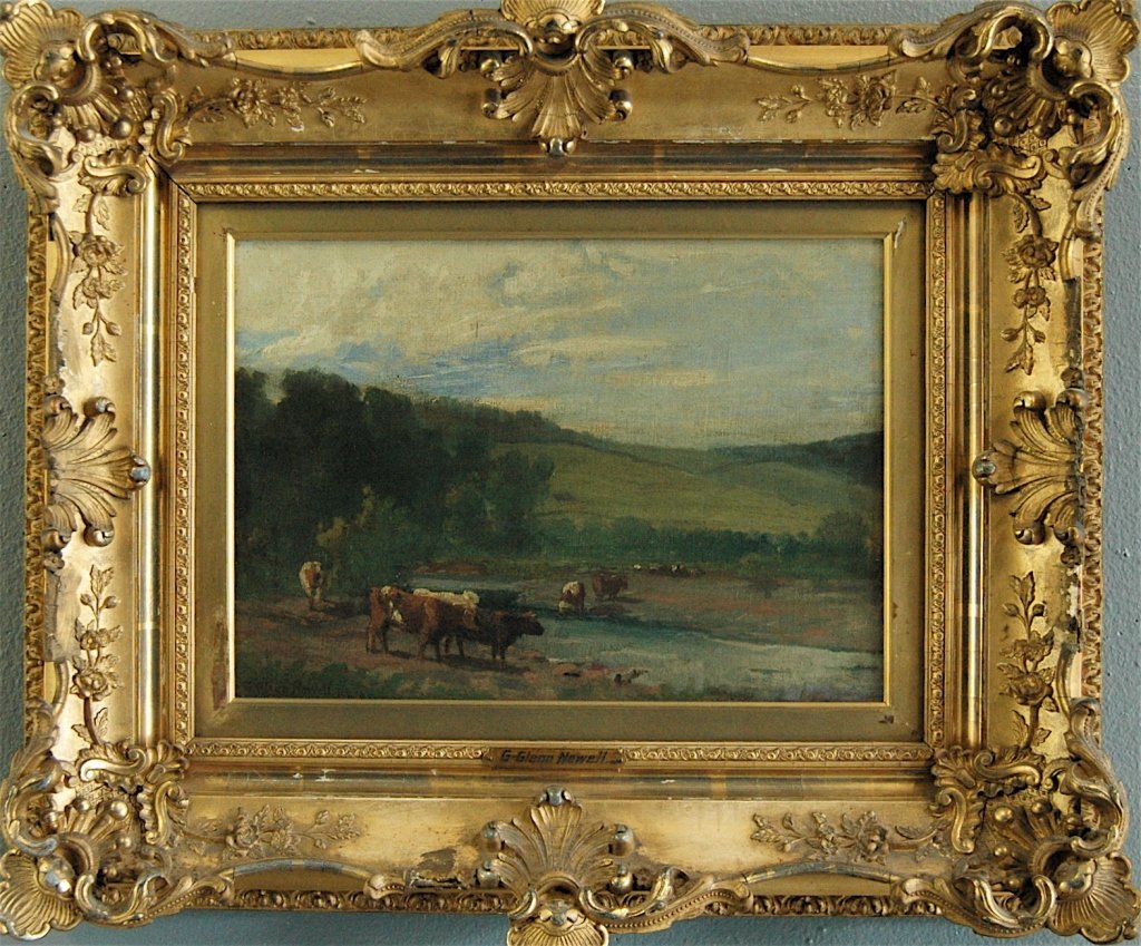 George Glenn Newell (1870-1947) O/C: George Glenn Newell (1870-1947), oil on canvas under glass, very ornate gold gesso frame. Tranquil scene of cows watering in rolling lea. Signed and dated LL with N.A. "05". Illegible penciling en ver