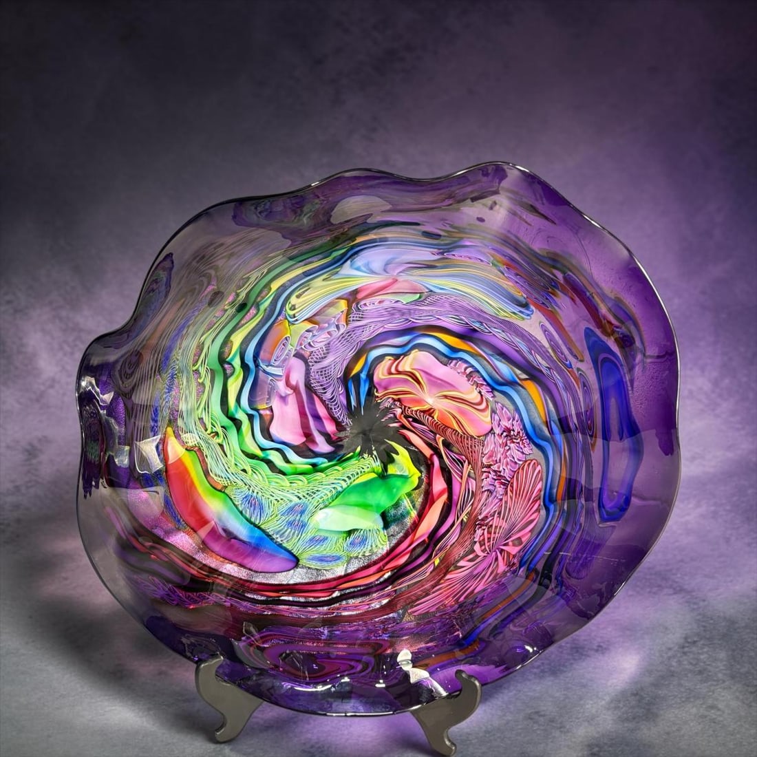 James Nowak Very Large 24" Art Glass Bowl: James Nowak Very Large 24" Art Glass Bowl. James E. Nowak (American, born 1956) studio art glass vase executed in a dramatic freeform flared silhouette with undulating rim. Surface richly decorated wi