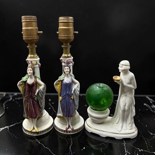 Estate Lot of 3 Vintage Art Deco Girl Style/ Egyptian Revival 8" Porcelain Table Lamps 1 Pair, 1 Sin: Estate Lot of 3 Vintage Art Deco Girl Style/ Egyptian Revival 8" Porcelain Table Lamps 1 Pair, 1 Single. 1). Pair of Porcelain Flapper Girl , marked Sarna Brass India on bottom on one the other has gr